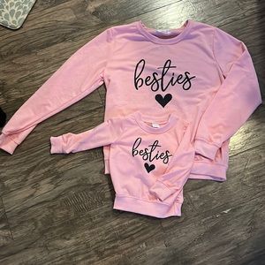 Mama and baby matching shirts.